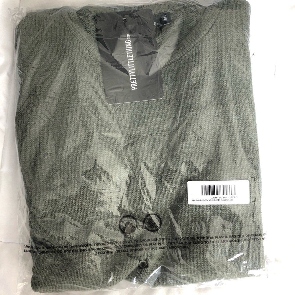 Sage green ruched tie side knit dress